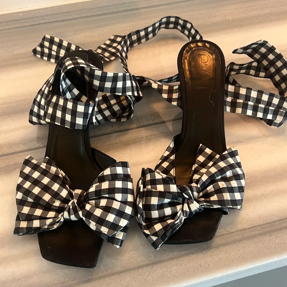 Ganni black and white kitten heels. The ties tie at ankle